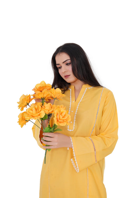 Soft bright yellow straight-cut kurti V-neck with white embroidered border detailing – women's cotton suit close-up Shadow Shenaz
